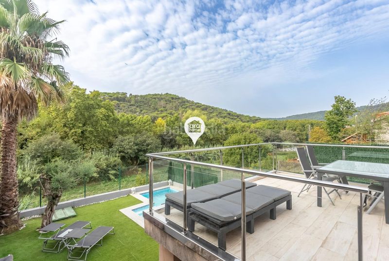 Foto 28e70479-8a59-437a-ab76-ce60dba5c885. Xalet amb aparcament piscina a Dosrius poble Dosrius