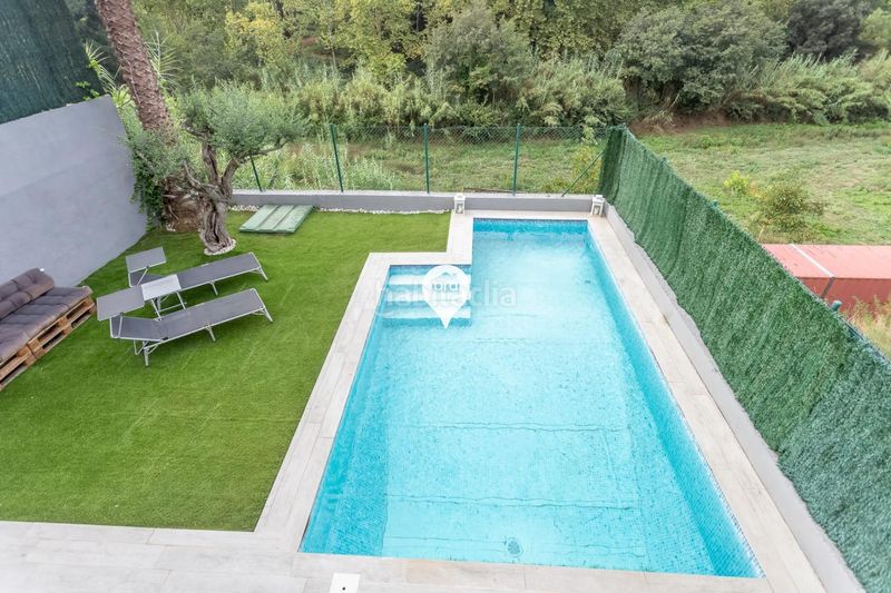 Foto d2741cb1-03de-44c3-8a7c-67365b732294. Xalet amb aparcament piscina a Dosrius poble Dosrius