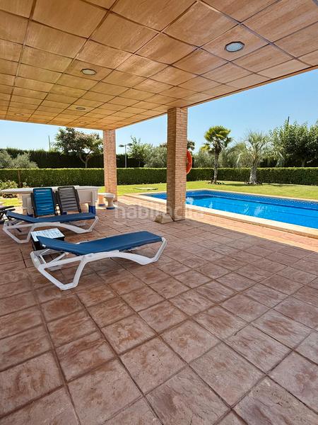 Foto d80416cb-b79b-40d5-8d99-6a0c625dabc8. Chalet avec cheminée chauffage parking piscine dans Torralba de Calatrava