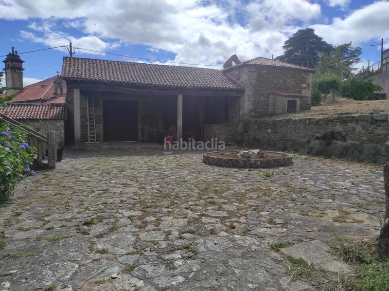 Foto e3b87669-b8d6-4e43-90d5-b9367ef47db4. Casa  de piedra con finca en lalin en Lalín