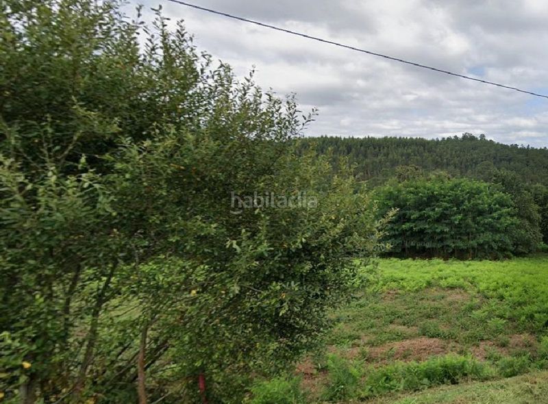 Foto bbac5258-4ccd-4563-ae7c-5a8e856d8f75. Terreny residencial a Boqueixón