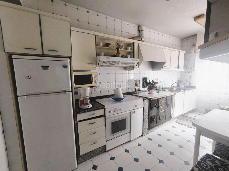 Foto 139c7c42-f8fe-4703-aeb0-45cecb644266. Casa amb aparcament a Campus Sur - Santa Marta Santiago de Compostela