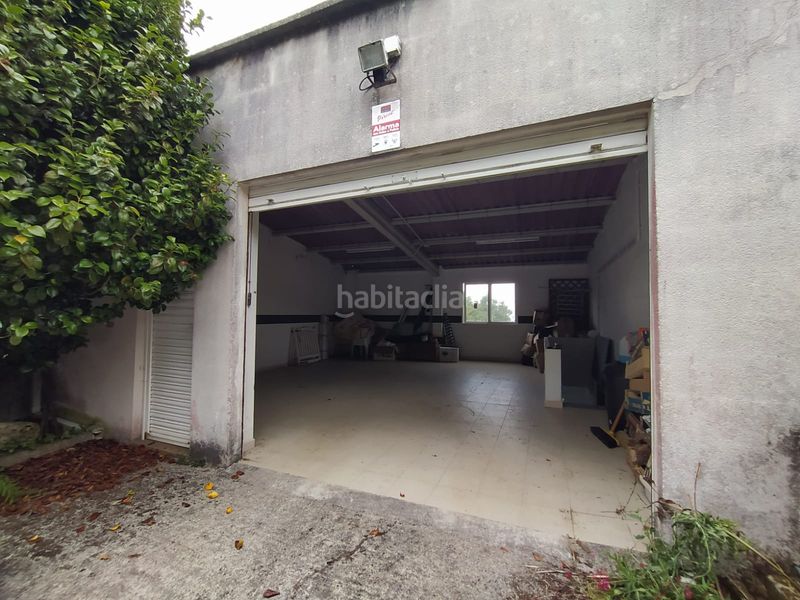 Foto f1a79a64-c801-4d60-97c5-43b9630455b0. Parking voiture dans Cariño