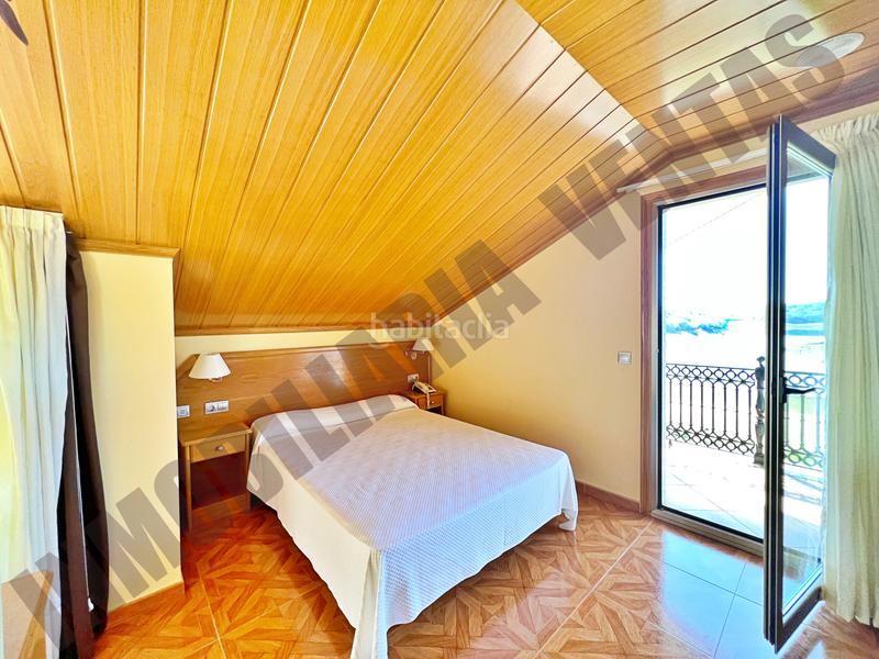 Foto ee5921af-4ab8-43e1-bc4a-350e996552de. Edifici a Incio (O)