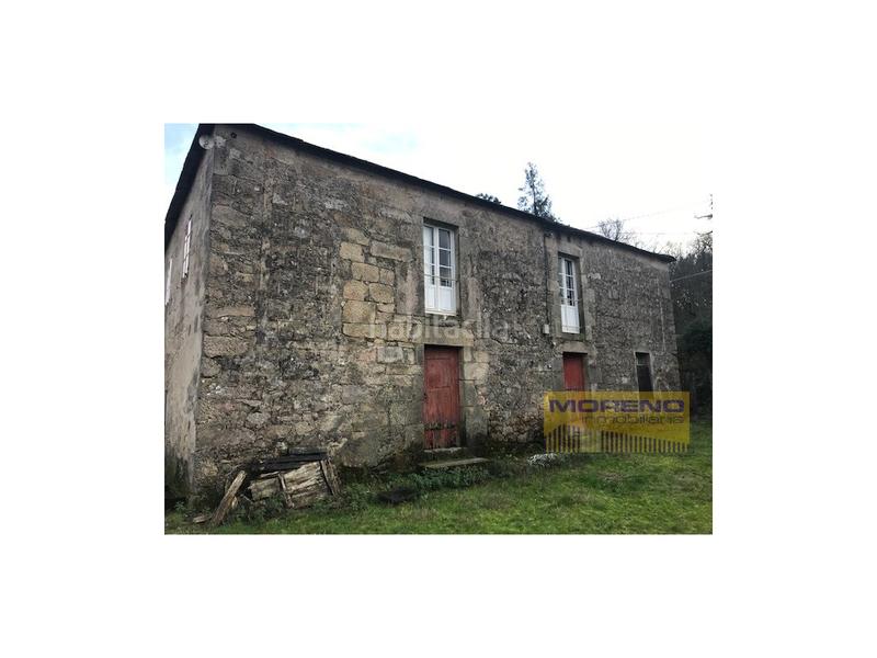 Foto f58c9821-a105-4ea5-923a-fe284ce99c67. Masía casa rustica en nucleo con finca y varias edificaciones en Láncara