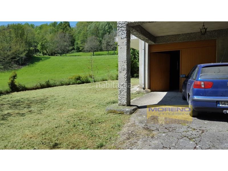 Foto 8874db86-97b7-47c0-9d9a-7e409df8cc01. Casa aparellada a Nogais (As)