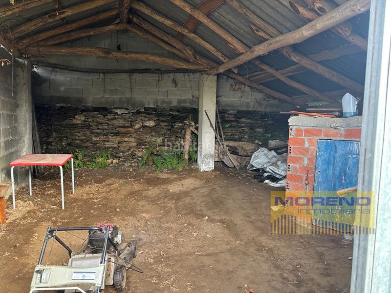 Foto f2b9ae35-82a1-45fb-9436-9c10bcf8df76. Maison avec parking dans Samos