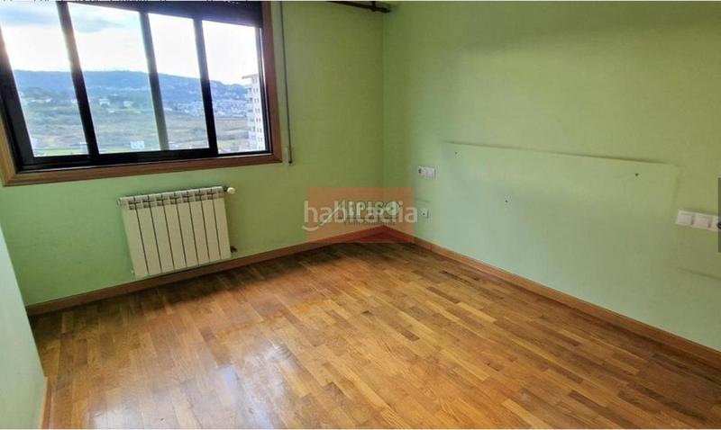 Foto 2aa3c1fd-832f-4500-a1ee-b245809437e4. Dúplex amb calefacció aparcament a Mariñamansa Ourense