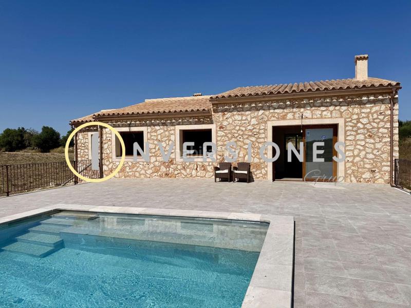 Foto 197265b7-612c-4f99-b892-2763e0f55e33. Country house with heating pool in Manacor centre Manacor
