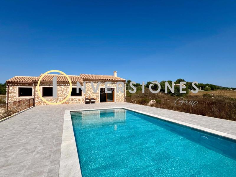 Foto 62d05355-0f74-4244-ae44-d277e8ea6090. Country house with heating pool in Manacor centre Manacor