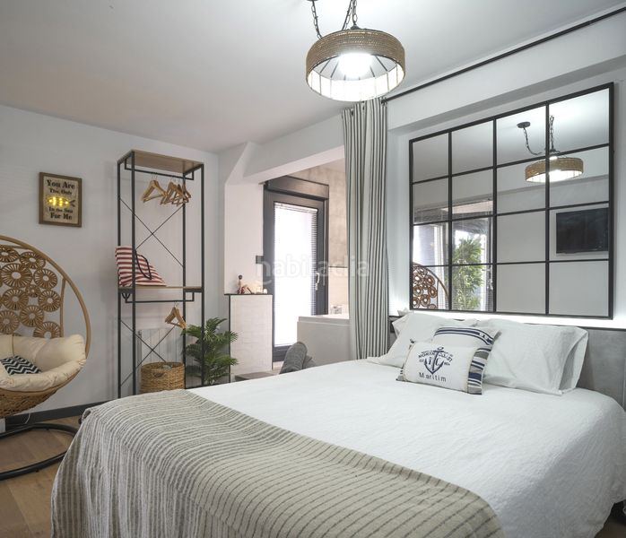 Foto 379f6094-f4d1-4763-8544-90a277af0282. Àtic amb xemeneia calefacció piscina a Larrea - San Juan de Dios - Peñota Santurtzi