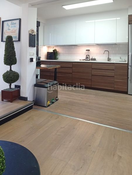 Foto a314a743-2ac6-4201-a598-5a89ea7e8602. Àtic amb xemeneia calefacció piscina a Larrea - San Juan de Dios - Peñota Santurtzi