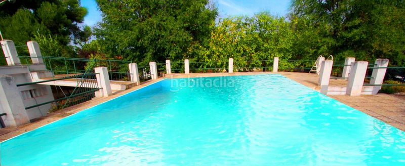 Foto acbf47d2-b98a-40a1-bb53-98f64db2a5af. Xalet amb xemeneia calefacció aparcament piscina a Albacete