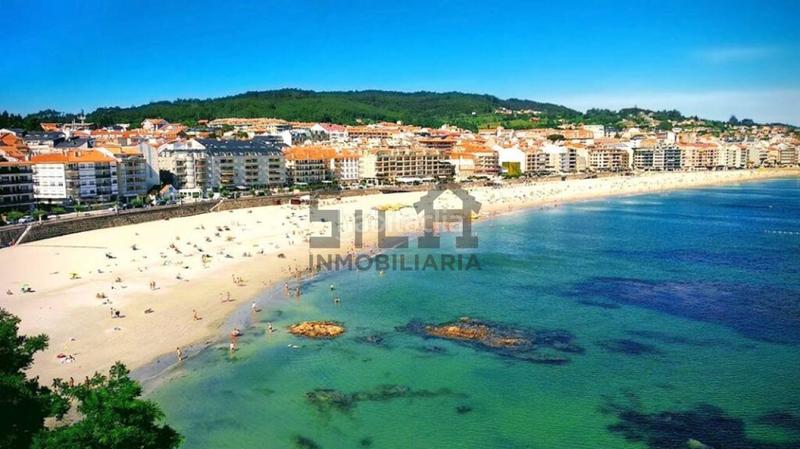 Foto 15fd1125-8a48-40fd-8174-34dc7dc3dbdf. Apartament amb calefacció aparcament a Adina - Portonovo Sanxenxo
