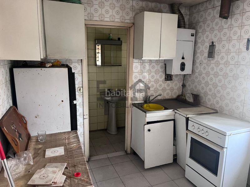 Foto a76439ad-ae29-4c3c-a9ba-24eb6936f86b. Casa amb calefacció a As Lagoas Ourense