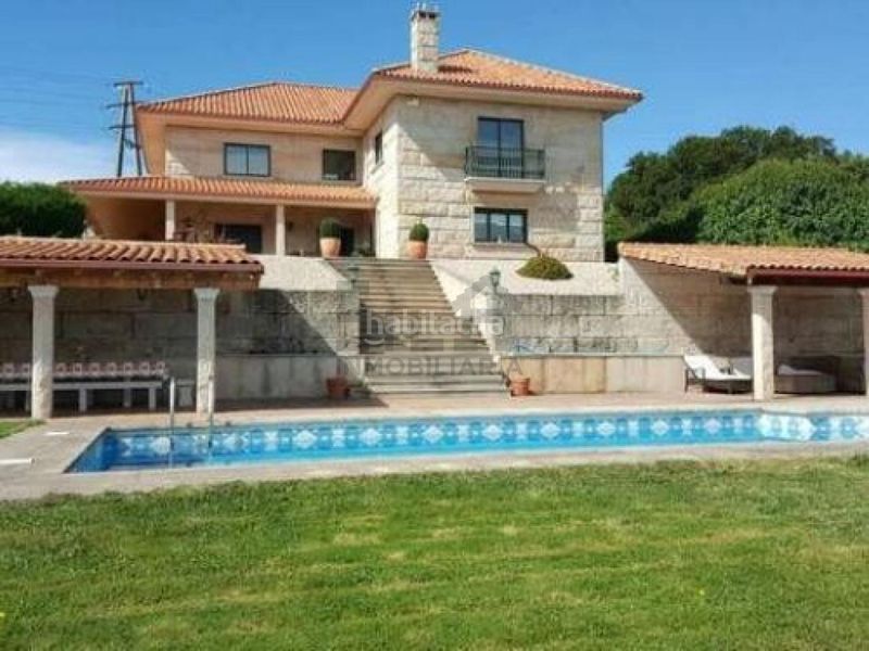 Foto fcc22922-9eaf-4875-aa96-f9922667493a. Chalet con riscaldamento parcheggio piscina in Barrocanes Ourense