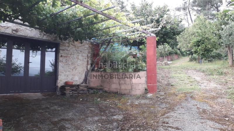 Foto 52980f3e-d6b2-4480-8b56-f06d66fd1261. Chalet avec chauffage parking dans Castrelo de Miño