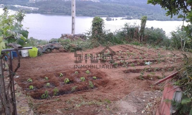 Foto ca5f5b7f-c789-46e0-89eb-82c1738a4fe2. Chalet con riscaldamento parcheggio in Castrelo de Miño