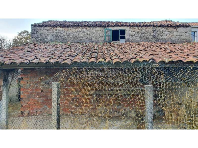 Foto e54b5f68-f3ac-4586-be76-27d7432f2cce. Casa en fachal 11 casa en venta en Vilasantar