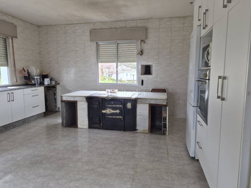 Foto 9c3227d2-48df-4bd2-819e-7cdfb47db1ed. Casa amb aparcament a Sobrado