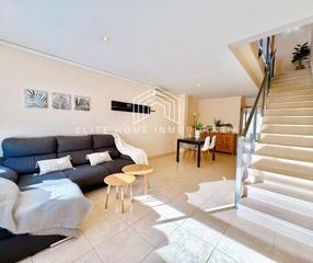 Casa a schiera in Playa-Ben Afeli. Impecable adosado de dos alturas en urbanización con piscina y p