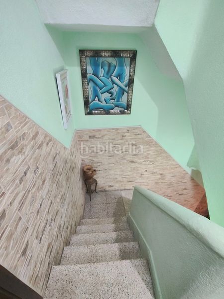 Foto dc0b054f-b4a3-44aa-8749-e1eb34465095. Casa adossada a santa uxía de Ribeira Ribeira