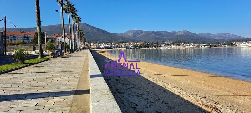 Foto 24bffafa-1efc-464f-800c-9db12bf15e95. Casa adosada casa céntrica con vistas y terraza en Pobra do Caramiñal (A)