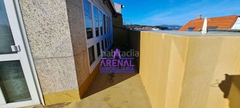 Foto 9014e8d2-d8d0-4e4c-b199-0ef472deb1ce. Casa adosada casa céntrica con vistas y terraza en Pobra do Caramiñal (A)