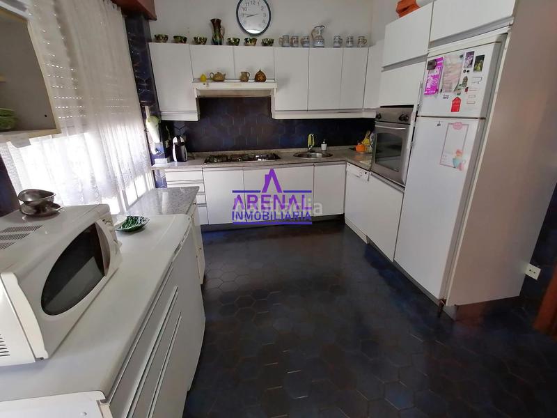 Foto a83bcd55-78b0-46e6-99a3-73e06eb58c00. Casa adosada casa céntrica con vistas y terraza en Pobra do Caramiñal (A)