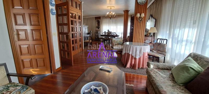 Foto c2bfc9e3-7afb-4a5b-aca9-71a311e91eee. Casa adosada casa céntrica con vistas y terraza en Pobra do Caramiñal (A)