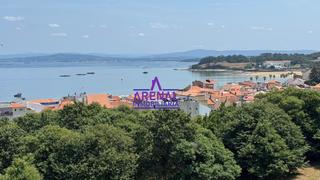 Àtic a Pobra do Caramiñal (A). Con vistas al mar