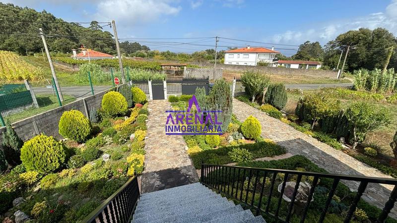 Foto b36fad6b-ed50-457e-a095-453917728e1d. Chalet in Boiro