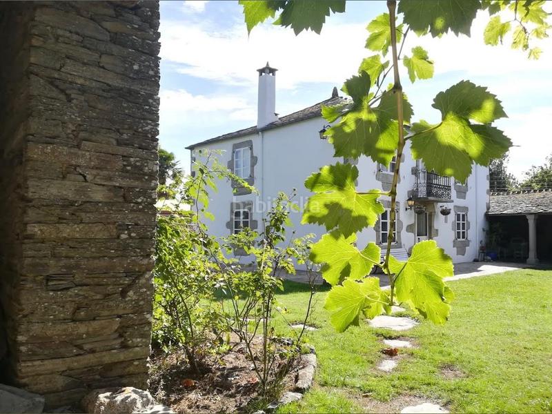 Foto fe010235-d6f0-4ede-bb1c-e8a391f4b748. Casale con camino parcheggio piscina in Outeiro de Rei