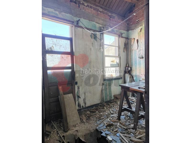Foto e8a10c63-275b-48f9-8ccb-9dcda66b5423. Casa adosada casa para rehabilitación integral en milagrosa en Lugo
