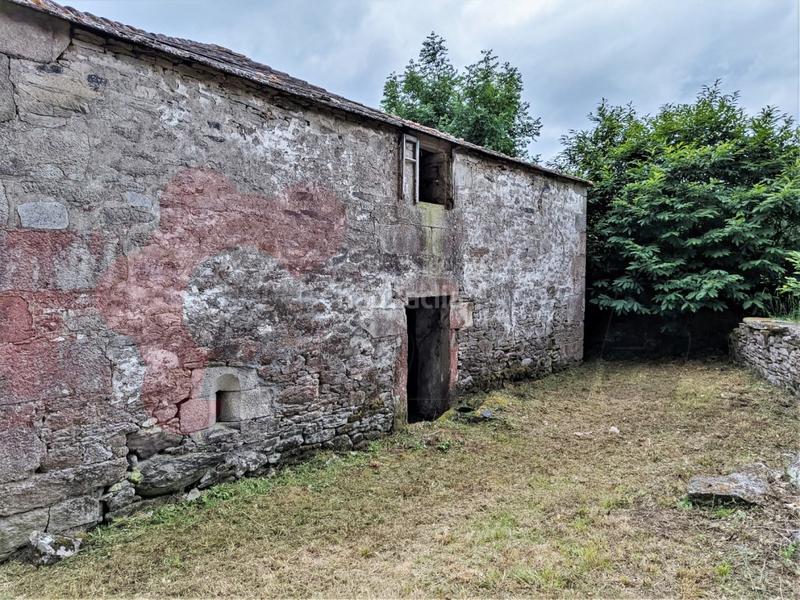 Foto 5ed00b2b-c0de-489e-add0-163b8bf8f579. Casa  de piedra en Outeiro de Rei