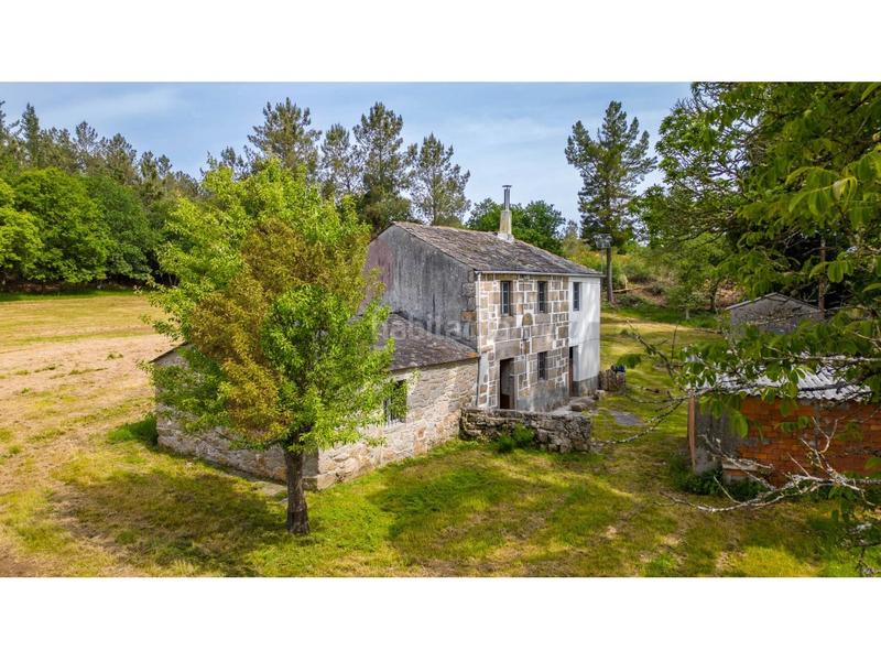 Foto 1a4103e8-8ecf-4ba9-955b-70fadd3fe386. Casa con parcheggio in Outeiro de Rei