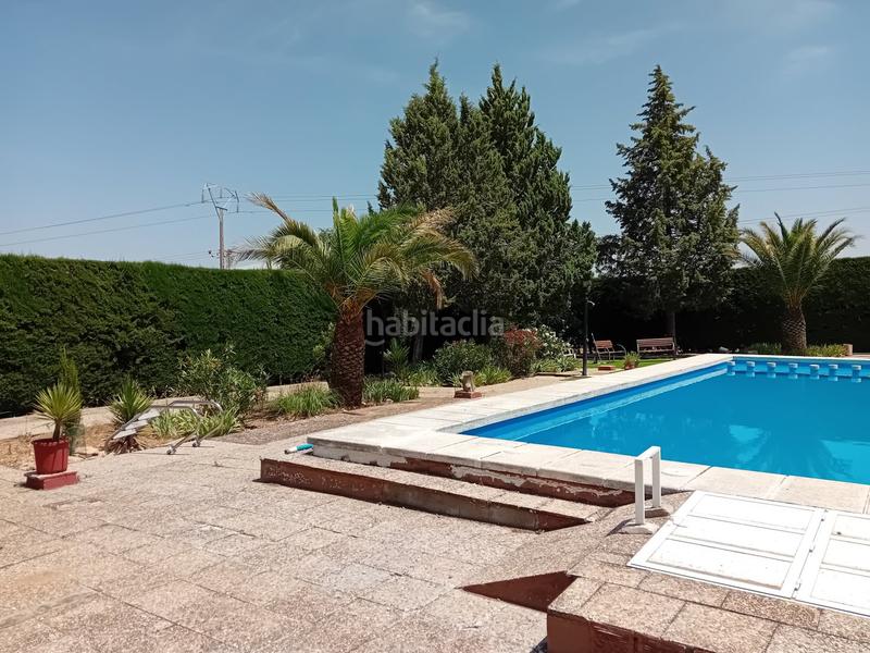 Foto 11bae977-1ba0-4174-9f63-46fbbd909638. Chalet  .dispone de 6 dormitorios, 3 baños, piscina, zona de cesped, pozo... todo legalizado. en Pozuelo de Calatrava