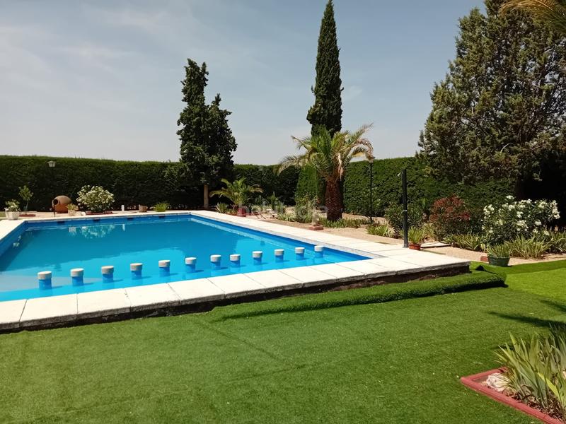 Foto 171b6d7a-fad4-4e06-b904-dec41c4e8e22. Chalet  .dispone de 6 dormitorios, 3 baños, piscina, zona de cesped, pozo... todo legalizado. en Pozuelo de Calatrava