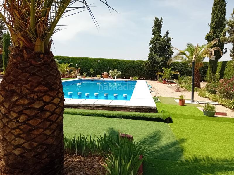Foto a8824a1d-12af-406f-9c77-9f2af5dc06a8. Chalet  .dispone de 6 dormitorios, 3 baños, piscina, zona de cesped, pozo... todo legalizado. en Pozuelo de Calatrava