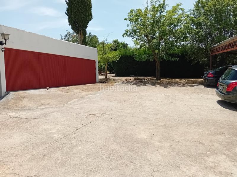 Foto a886608d-4741-4d77-9a28-d89ea0968640. Chalet  .dispone de 6 dormitorios, 3 baños, piscina, zona de cesped, pozo... todo legalizado. en Pozuelo de Calatrava
