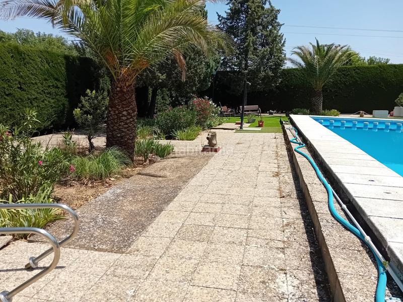 Foto bb3ff50a-c6ae-470a-9023-1e586ca13a9d. Chalet  .dispone de 6 dormitorios, 3 baños, piscina, zona de cesped, pozo... todo legalizado. en Pozuelo de Calatrava