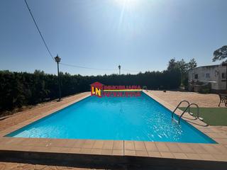 Maison à Carlota (La). Parcela con casa y piscina  en los algarbes