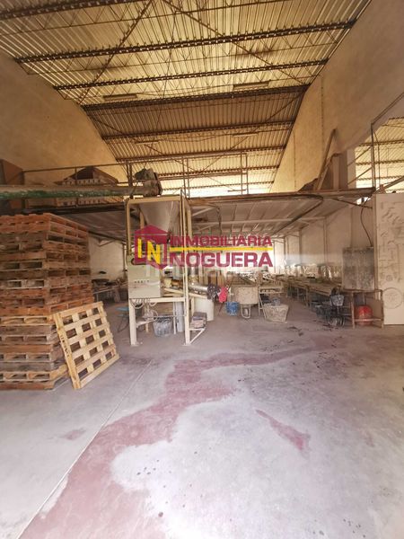 Foto 03207f0d-8327-4d9a-b4fe-b73172b260ac. Nau industrial a Écija