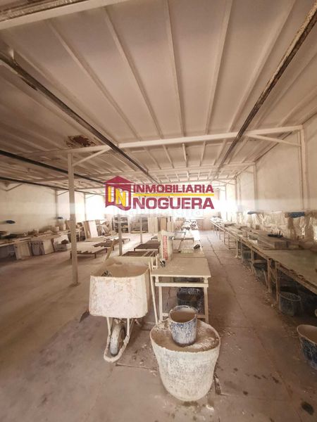 Foto 0384fa79-a4fc-484c-84f4-6044b01d4e26. Nau industrial a Écija