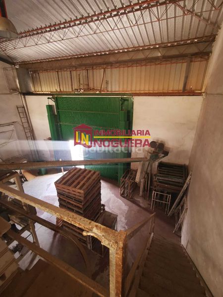 Foto bbcb9925-0cf3-4b16-adf4-94186448950b. Nau industrial a Écija