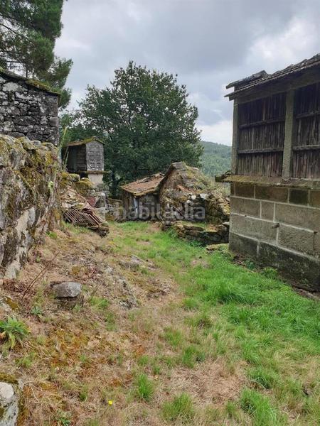 Foto 22a8e27f-4128-40d6-9e58-680a9b408a69. Casa conjunto de casas para restaurar en san isidro se vende conjunto de casas para rehabilitar en un entorno natural privilegiado, ide en Campo Lameiro