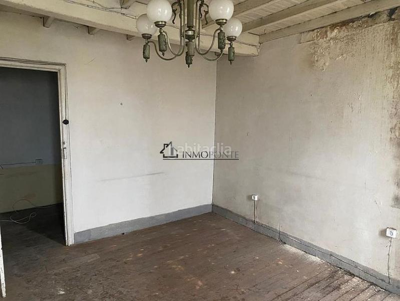 Foto 1a013ac2-4759-44a9-98f9-16ebd9442d47. Casa adossada a Pontecesures