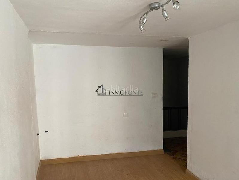 Foto 5c6a8f13-7339-4ea8-a10e-1bfd4e9d7d56. Casa adossada a Pontecesures