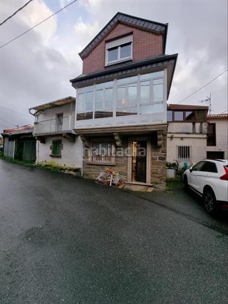 Foto 54d49d6a-7cf8-4f0e-8027-d7df0039521c. Casa adossada a Forcarei