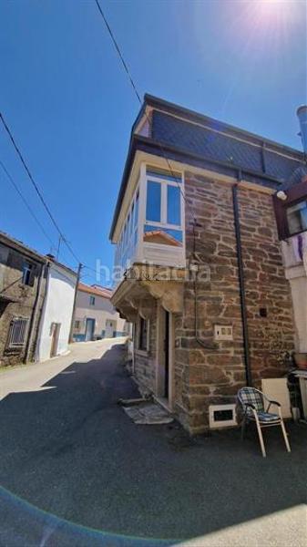 Foto a64802ea-b110-4b58-8279-2070d4d51090. Casa adossada a Forcarei